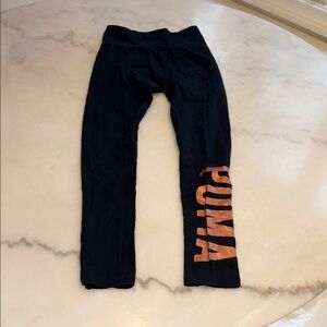 PUMA Kids Leggings in Black with Vibrant Orange Logo